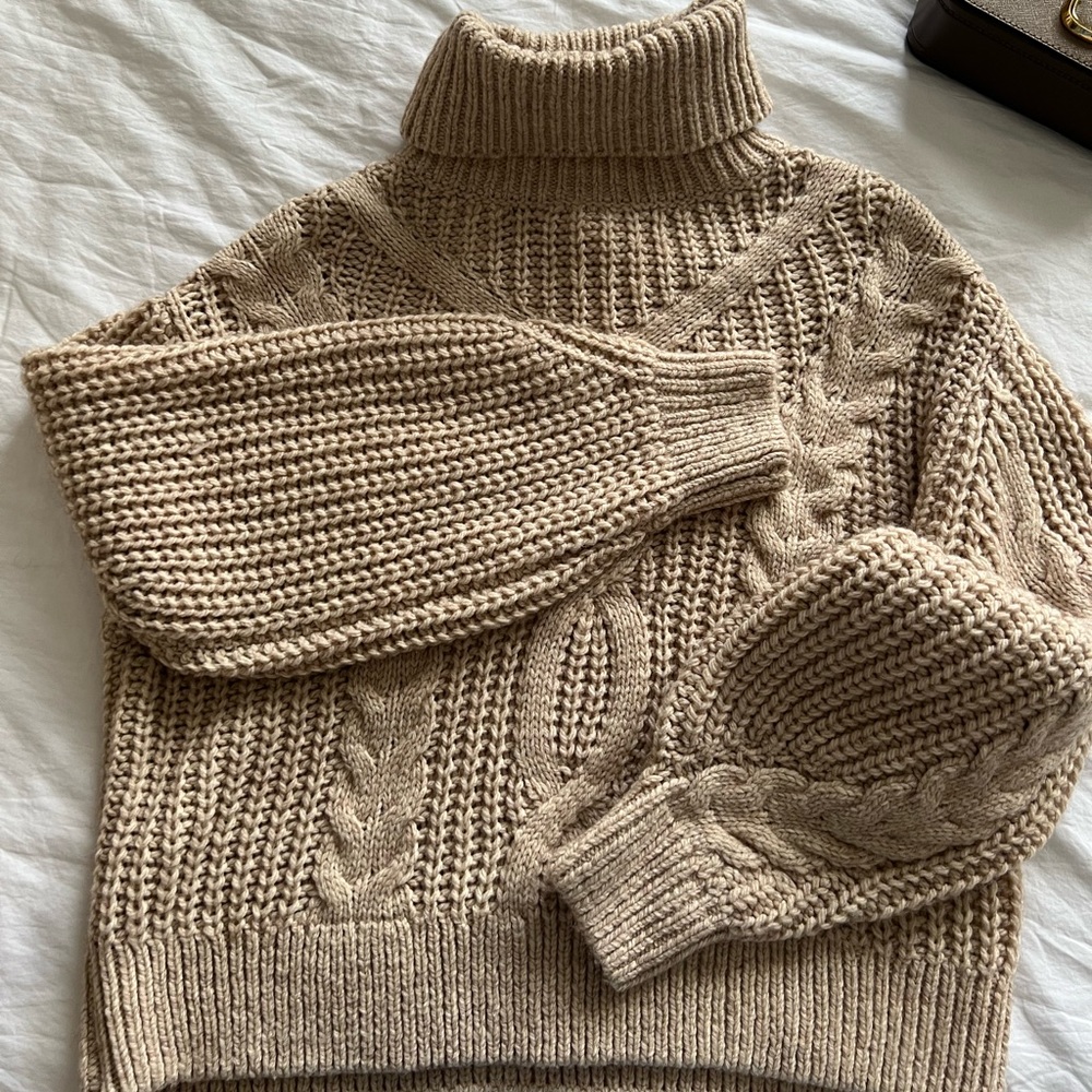 Turtleneck like new. Used twice. Beautiful crochet pattern.